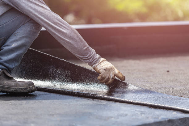 Professional Waterproofing technician working in Quincy, IN